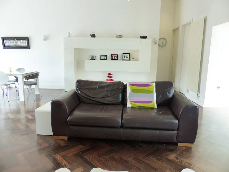 Living Room at 60s terraced home in Epping, D2447 (photo 4)