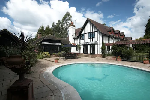 Tudor-style farmhouse in Woking, D1941