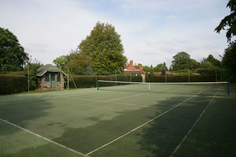Tennis court at Surrey Hills listed manor house, M68 (photo 33)