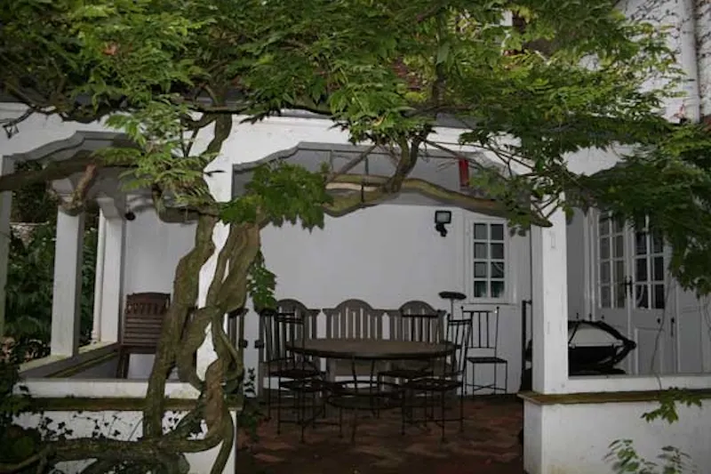 Conservatory at Colonial Southampton house, D1957 (photo 89)