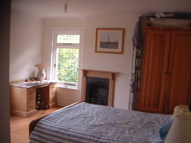 Bedroom at Pink Curbridge Victorian house, B1460 (photo 7)