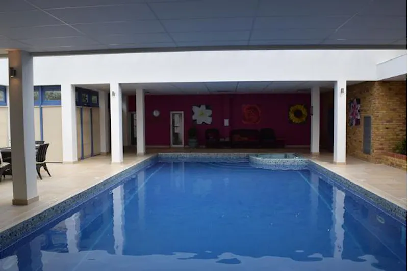 Swimming pool - indoor at Twickenham townhouse with pool, A980 (photo 13)