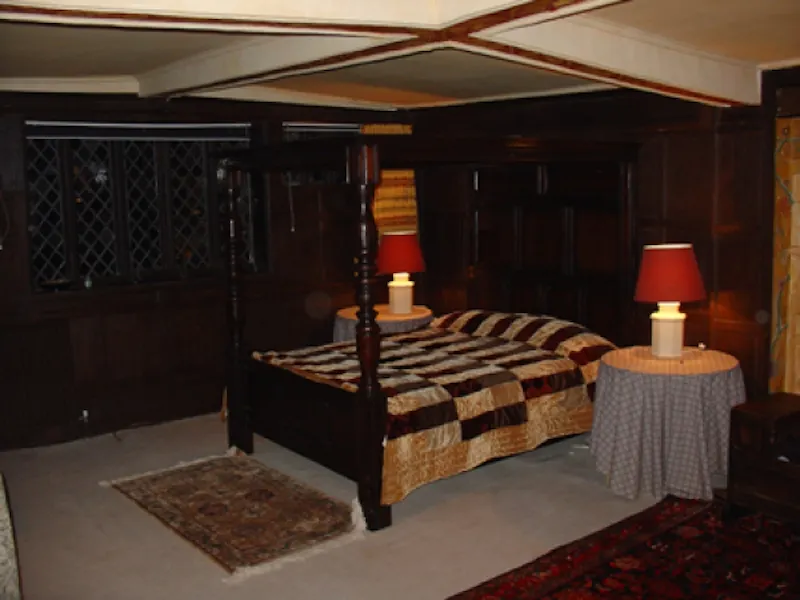 Bedroom at Suffolk moated Tudor hall house, M257 (photo 12)