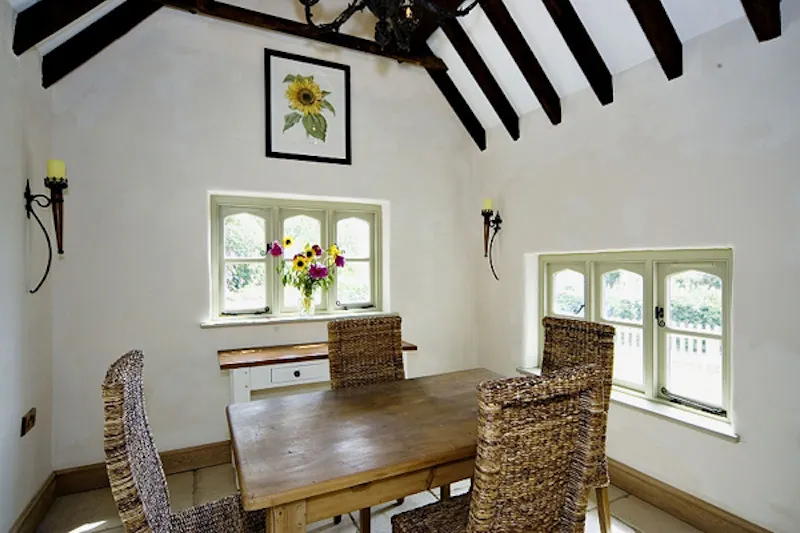 Dining room at Stapleford thatched cottage, C782 (photo 6)