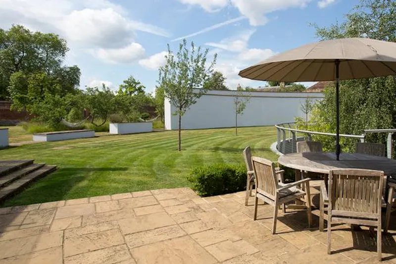 Terrace/Patio at Intriguing curved Hampton house, D2109 (photo 17)
