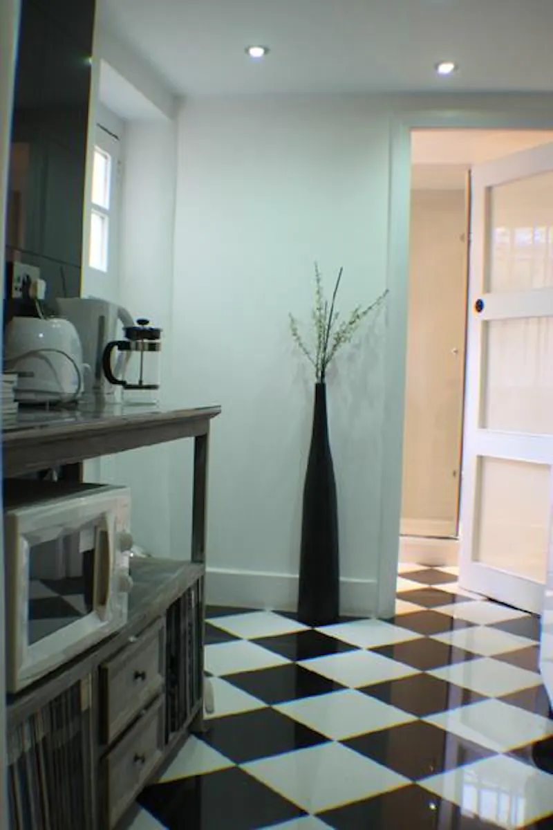 Kitchen at Empty Elephant and Castle house, A1304 (photo 21)