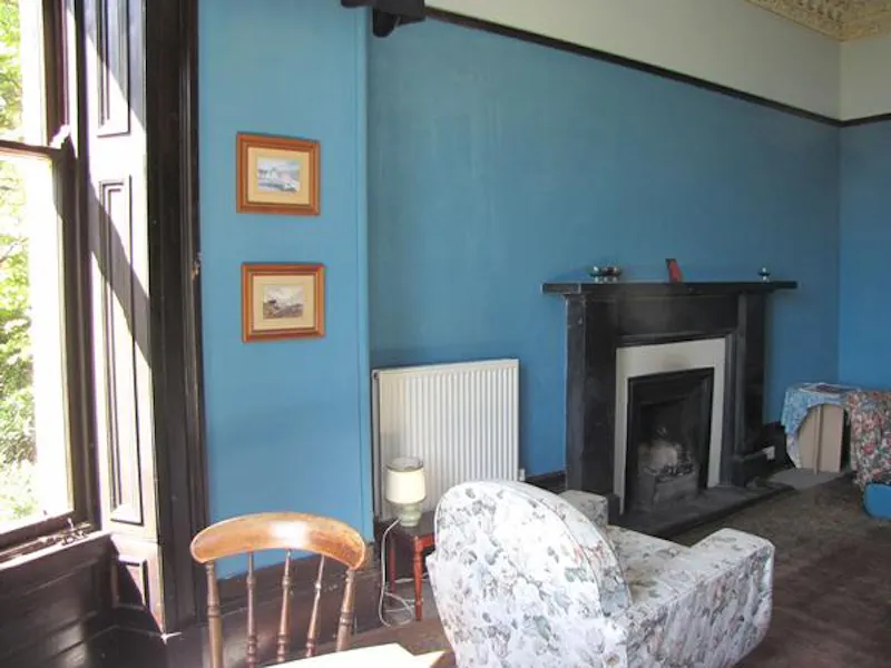 Fireplace at Stunning Kilcreggan stone house, B1630 (photo 2)