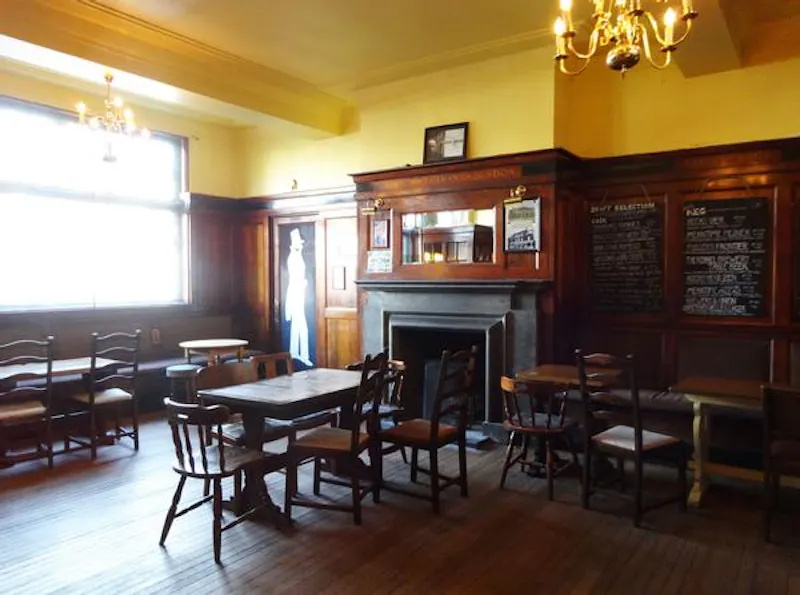 Dining room at Peckham panelled pub with stage, R781 (photo 9)