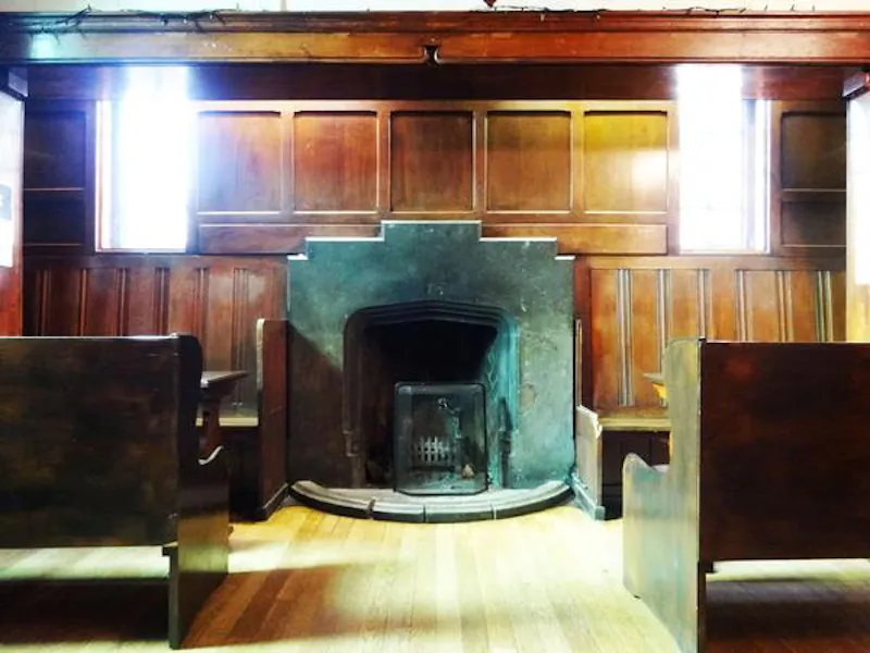 Fireplace at Peckham panelled pub with stage, R781 (photo 18)