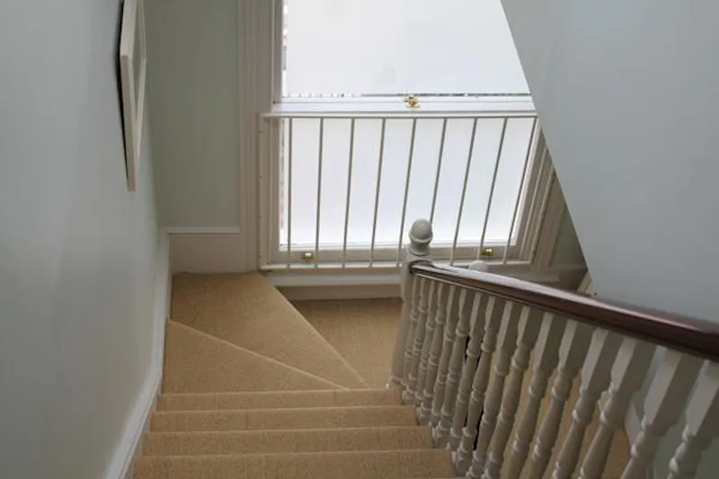 Staircase at Gunnersbury terraced family home, A1348 (photo 8)