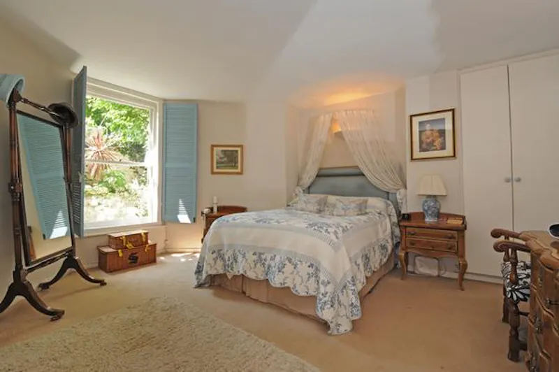 Bedroom at Brondesbury garden apartment, F1080 (photo 5)