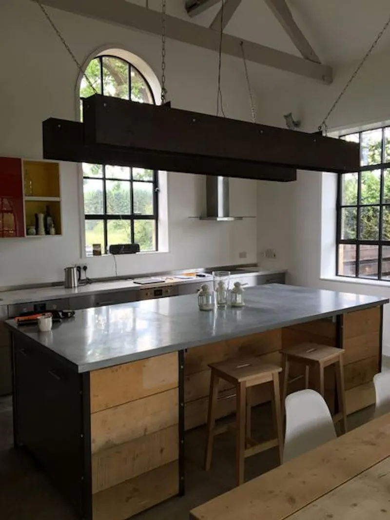 Kitchen island at Converted pump house in Norfolk, K414 (photo 3)