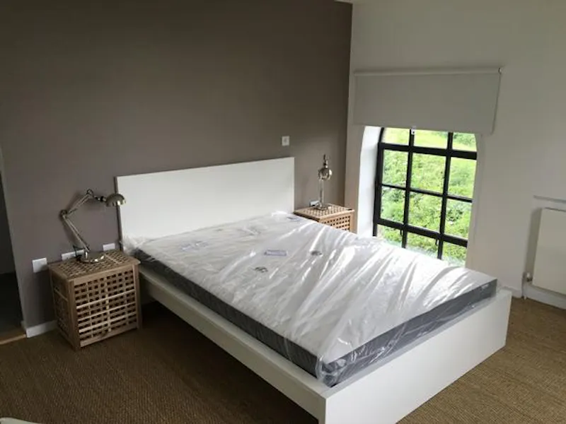 Bedroom at Converted pump house in Norfolk, K414 (photo 5)