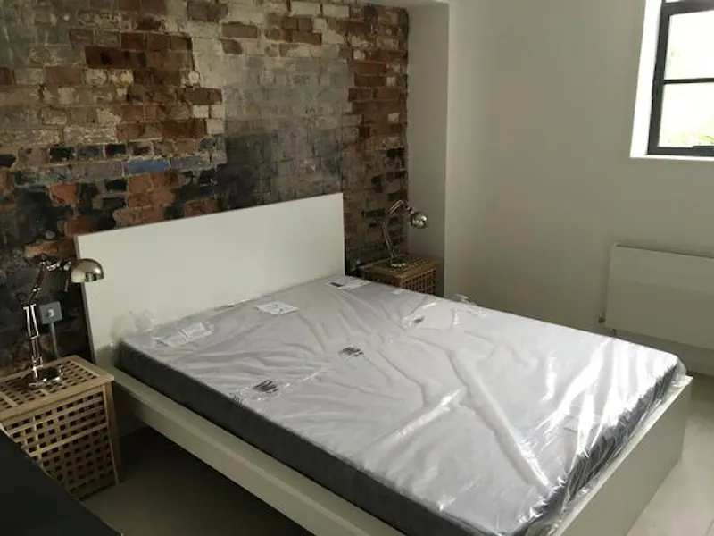 Bedroom at Converted pump house in Norfolk, K414 (photo 7)
