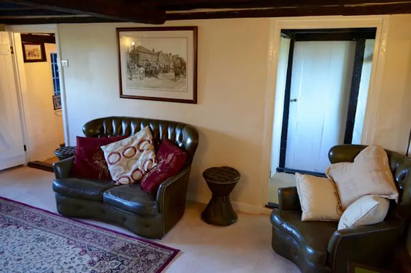 Living Room at Quaint thatched Essex cottage, M297 (photo 5)