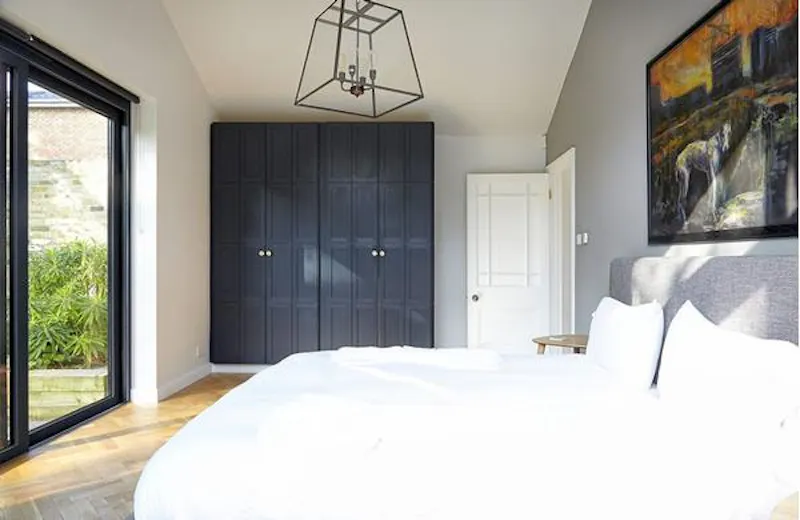Bedroom at Modern Clapham coach house, D2293 (photo 19)
