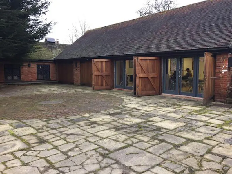 Courtyard at Guilford house & cottage, A1431 (photo 19)