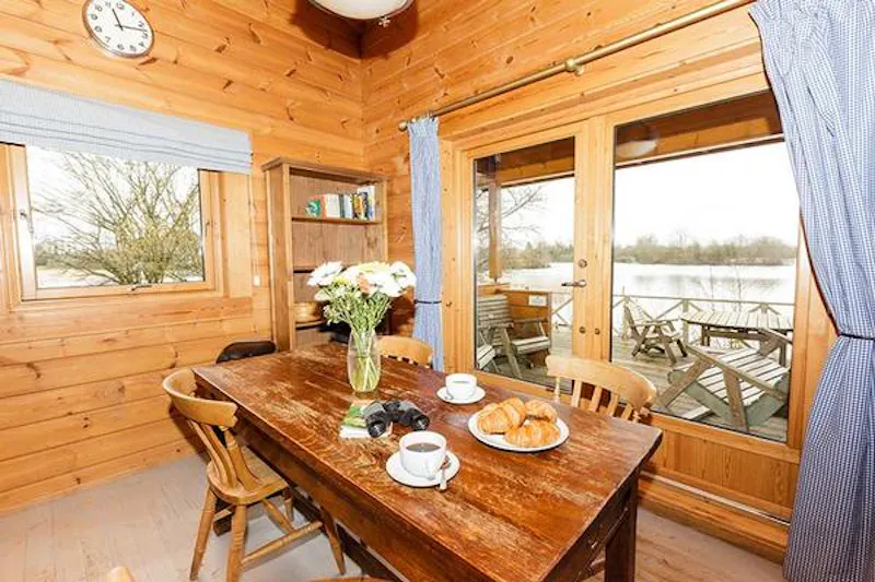 Dining room at Kemble lakeside cabin, Q124 (photo 17)