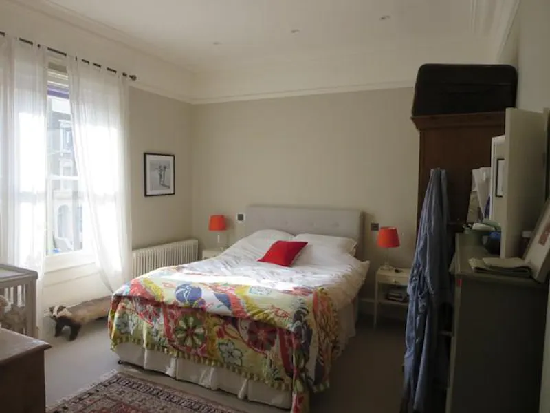 Bedroom at Colourful Peckham family home, D2324 (photo 17)