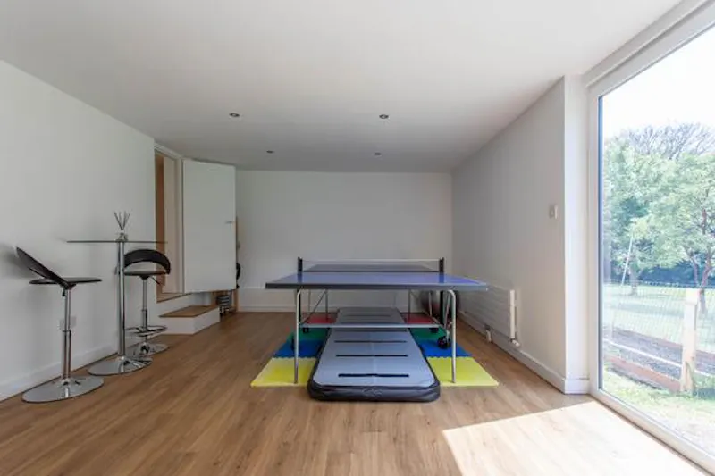 Games room at Modern High Wycombe house, D2410 (photo 56)