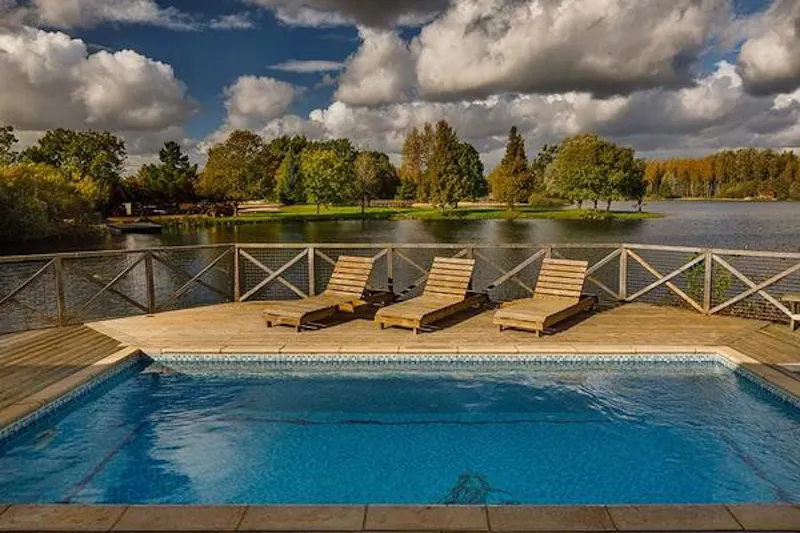 Swimming pool - outdoor at Kemble lakeside cabin, Q124 (photo 128)