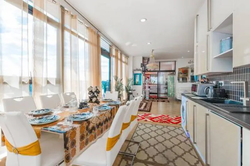 Dining room at Colourful Forest Gate penthouse, F1163 (photo 4)