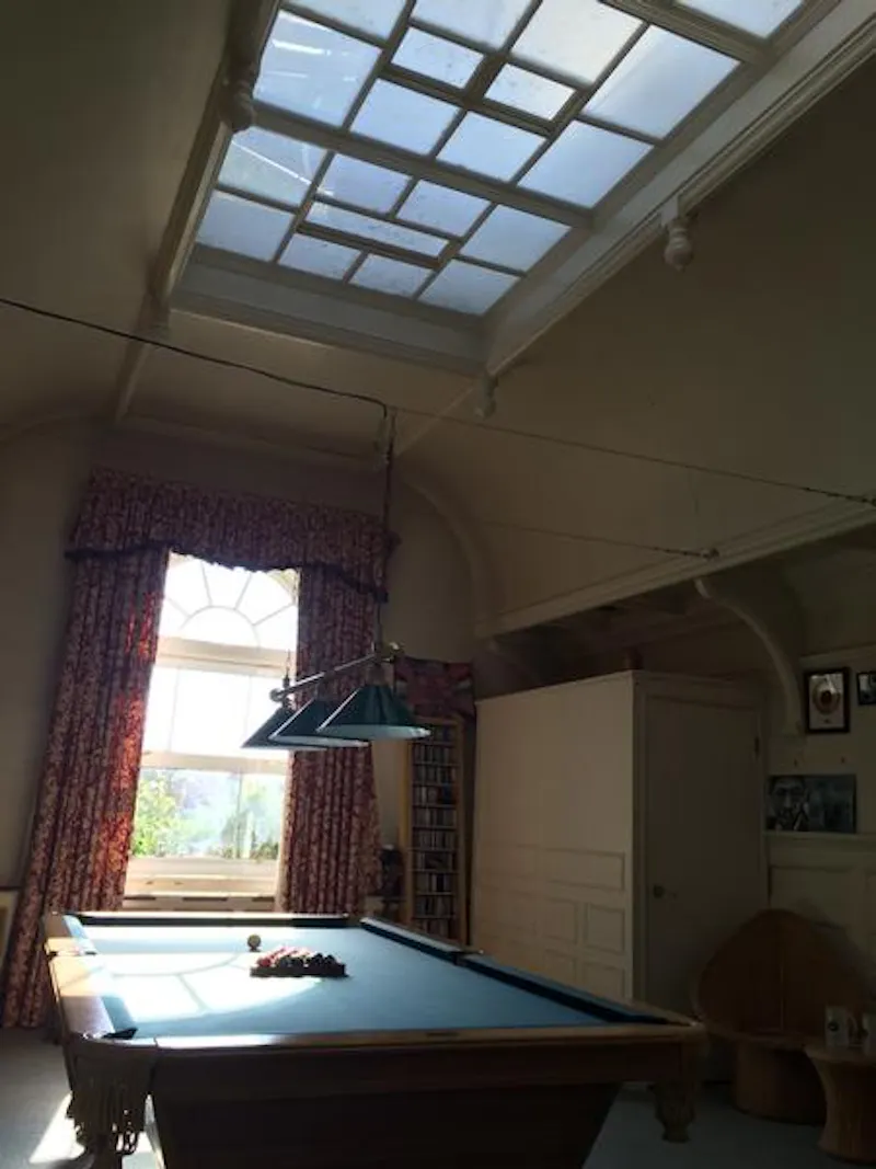 Games room at Interesting lodge house in Iver, B1813 (photo 8)