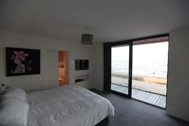 Bedroom at Ultra modern Kent beach house, K439 (photo 10)