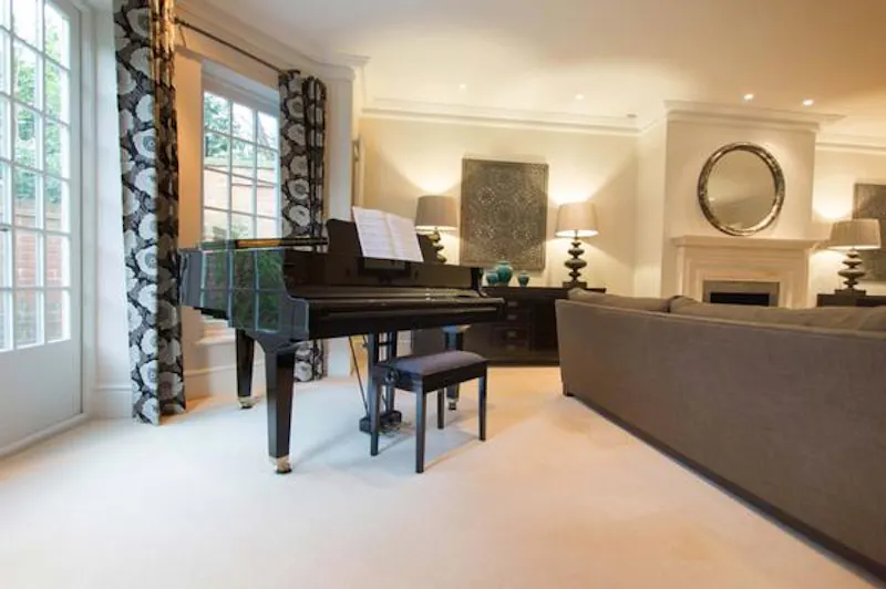 Piano at Ivy covered home in Windlesham, A1478 (photo 15)