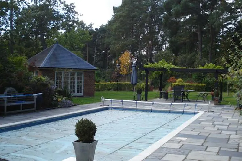 Swimming pool - outdoor at Ivy covered home in Windlesham, A1478 (photo 48)