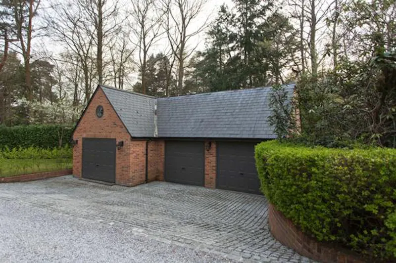 Garage at Ivy covered home in Windlesham, A1478 (photo 55)