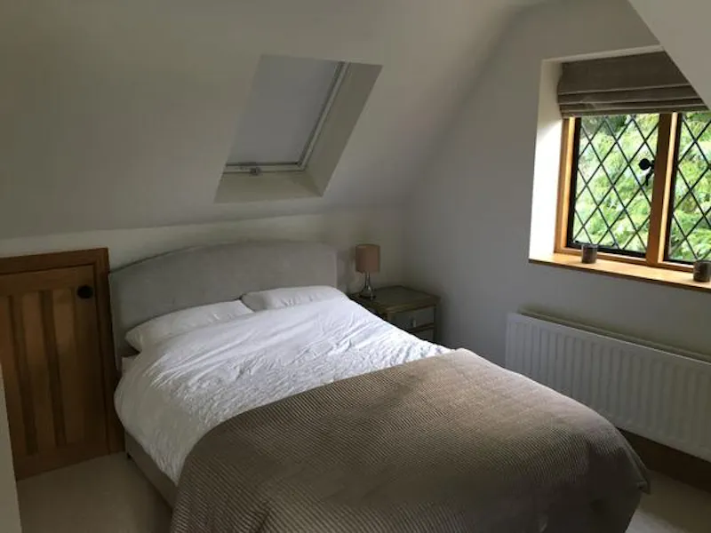 Bedroom at Surrey Tudor style home, M324 (photo 8)