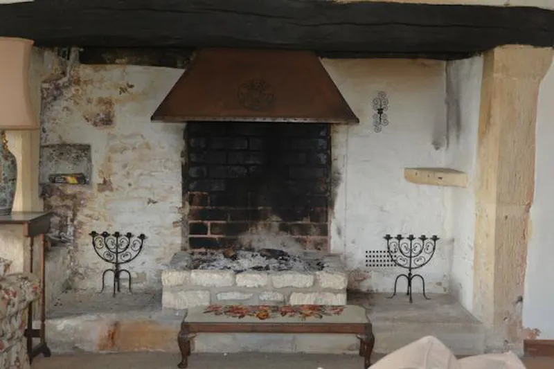 Fireplace at Remote ancient Cotswold farm, M327 (photo 8)