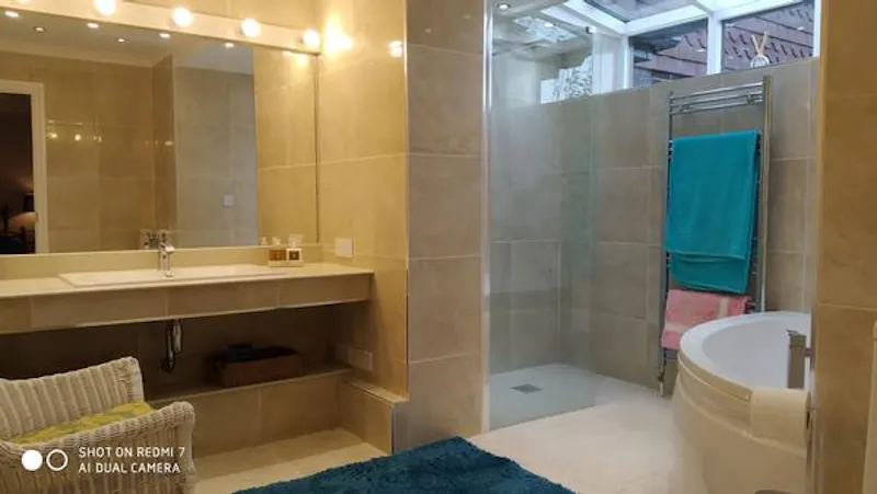 Bathroom at Retro Surrey new build, D2442 (photo 17)