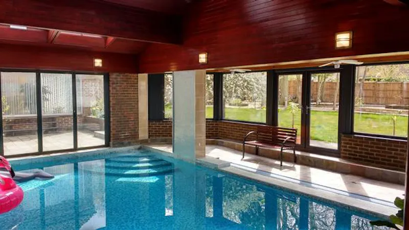 Swimming pool - indoor at Retro Surrey new build, D2442 (photo 23)