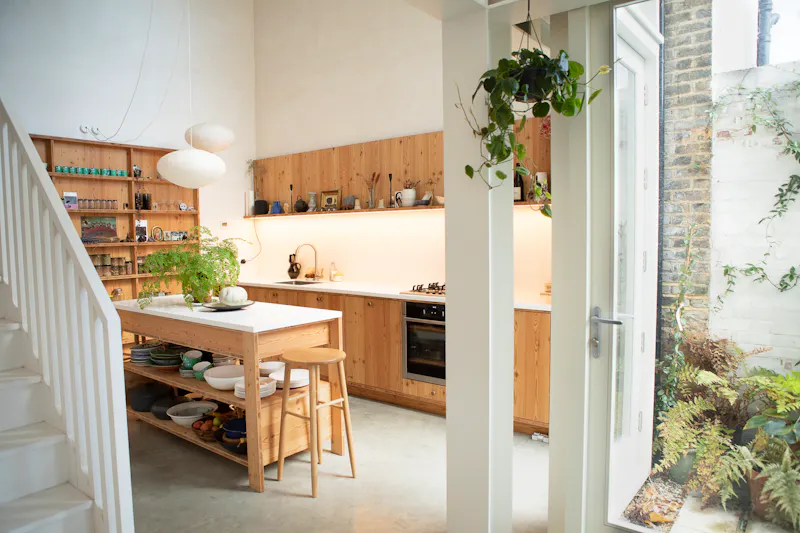 Kitchen at Minimal Peckham atrium house, K449 (photo 13)