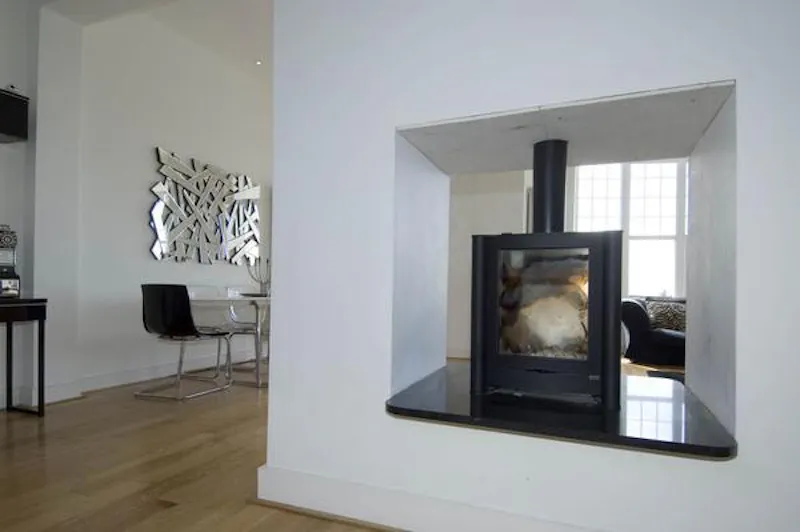Fireplace at Contemporary Langland house, W208 (photo 7)