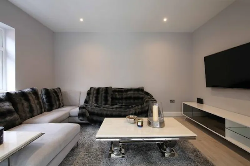 Living Room at Modern house in Raynes Park, D2451 (photo 13)