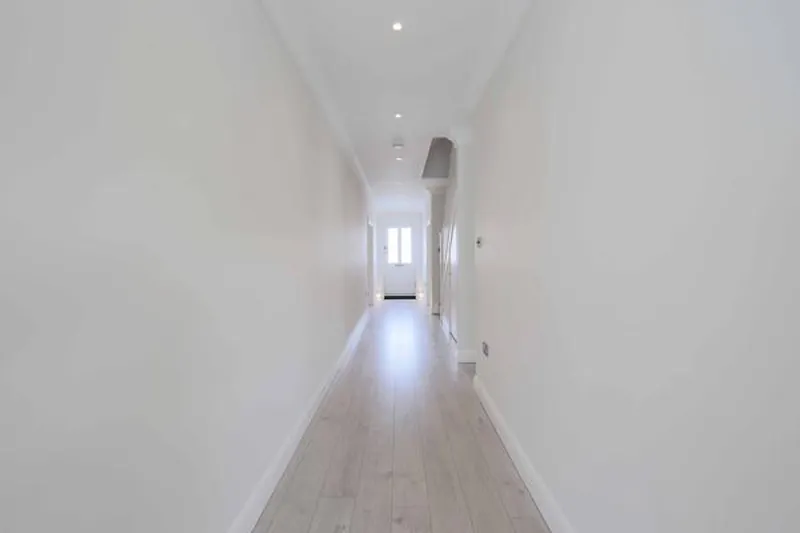 Entrance hall at Modern house in Raynes Park, D2451 (photo 3)