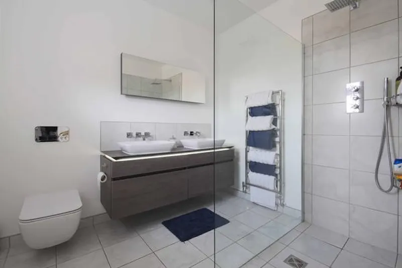 Shower at Modern house in Raynes Park, D2451 (photo 24)