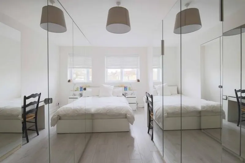 Bedroom at Modern house in Raynes Park, D2451 (photo 34)