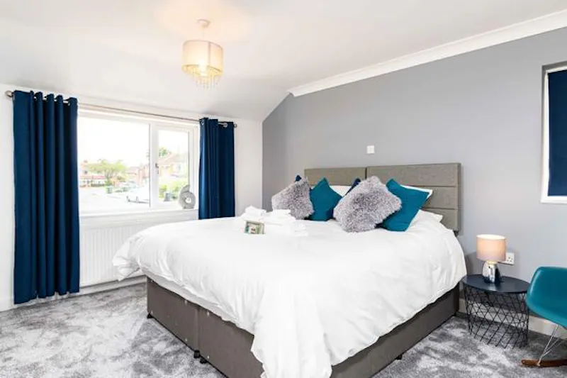 Bedroom at Colourful Knowle family house, D2463 (photo 11)