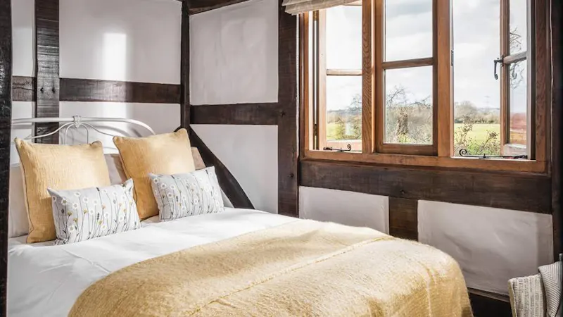 Bedroom at Riverside cottage in New Forest, M349 (photo 7)