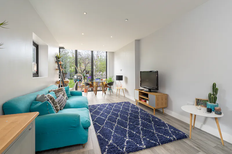 Living Room at Colourful flat in Palmers Green, B1959 (photo 2)