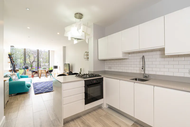 Kitchen at Colourful flat in Palmers Green, B1959 (photo 5)