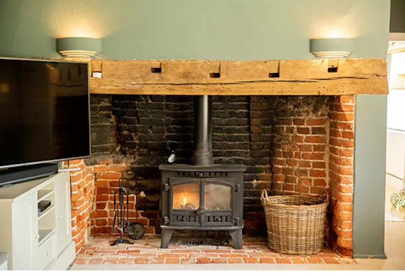 Fireplace at Country cottage in Derry Down, D2563 (photo 8)