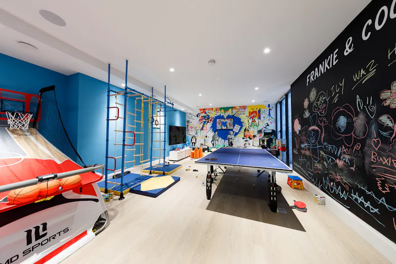 Games room at Modern house in Stanmore, D2543 (photo 30)