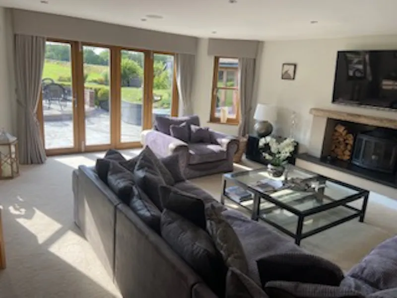 Living Room at Chobham farm lodge, D2569 (photo 4)