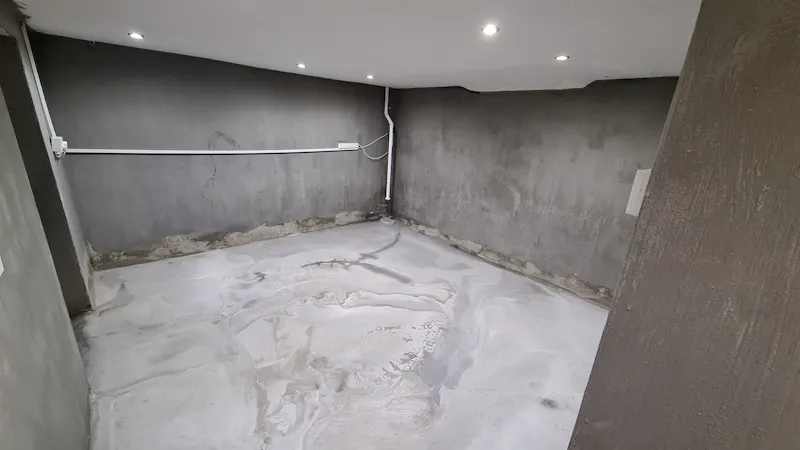 Concrete at County pool house in Addington, D2596 (photo 31)