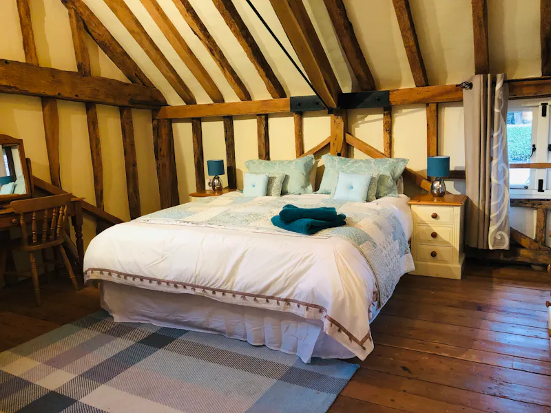 Bedroom at Contemporary Pirbright barn, L551 (photo 16)